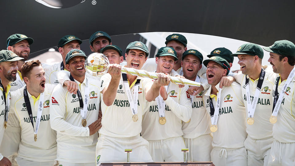 In the centre, Pat Cummins celebrates with his Aussie side after winning the WTC final.