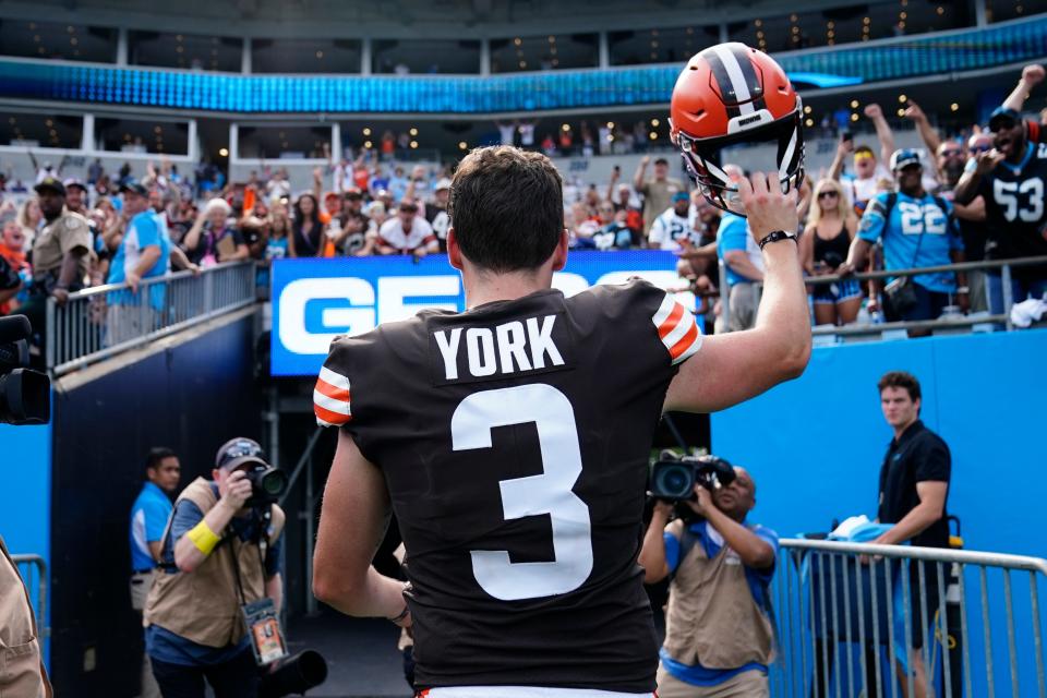 Browns kicker Cade York waves as he leaves the field after he made the game-winning field goal to beat the Panthers, Sunday, Sept. 11, 2022, in Charlotte, N.C.