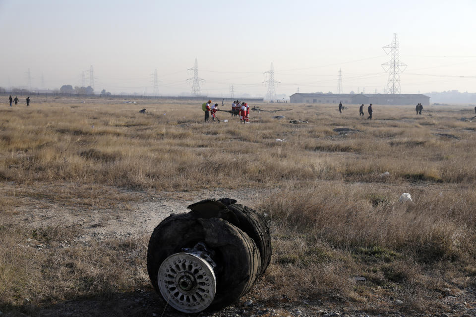 Debris is seen from an Ukrainian plane which crashed as rescue workers search the scene in Shahedshahr southwest of the capital Tehran, Iran, Wednesday, Jan. 8, 2020. (Photo: Ebrahim Noroozi/AP)