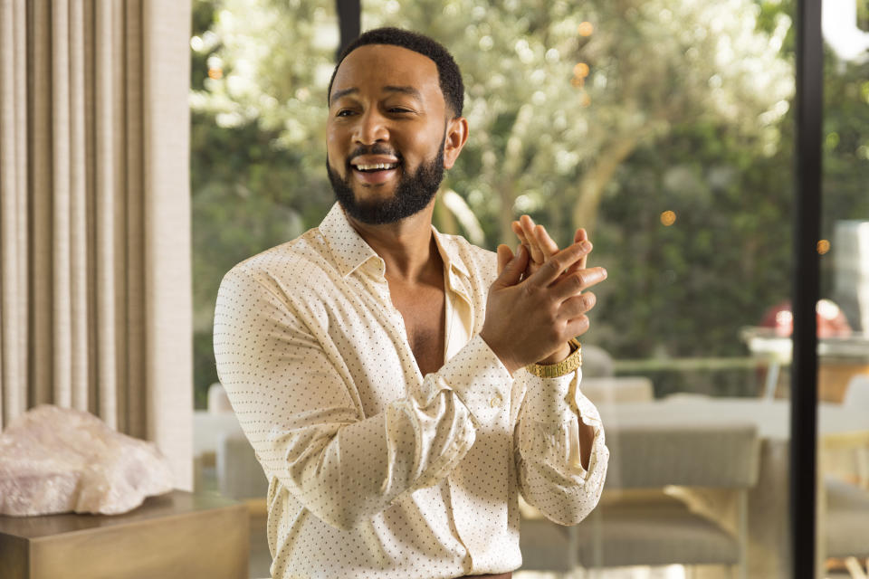 John Legend poses for a portrait on Monday, Aug. 15, 2022, in West Hollywood, Calif., to promote his latest double album "Legend." (Photo by Willy Sanjuan/Invision/AP)