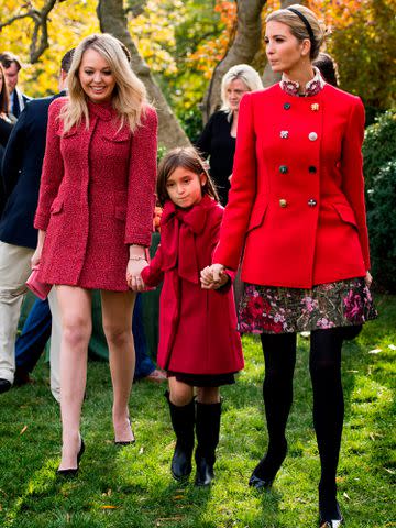 <p>JIM WATSON/AFP/Getty</p> Ivanka Trump holds her daughter Arabella Kushner's hand as she walk with sister Tiffany Trump (L) after viewing the pardoned Thanksgiving turkey Drumstick in the Rose Garden of the White House on November 21, 2017.