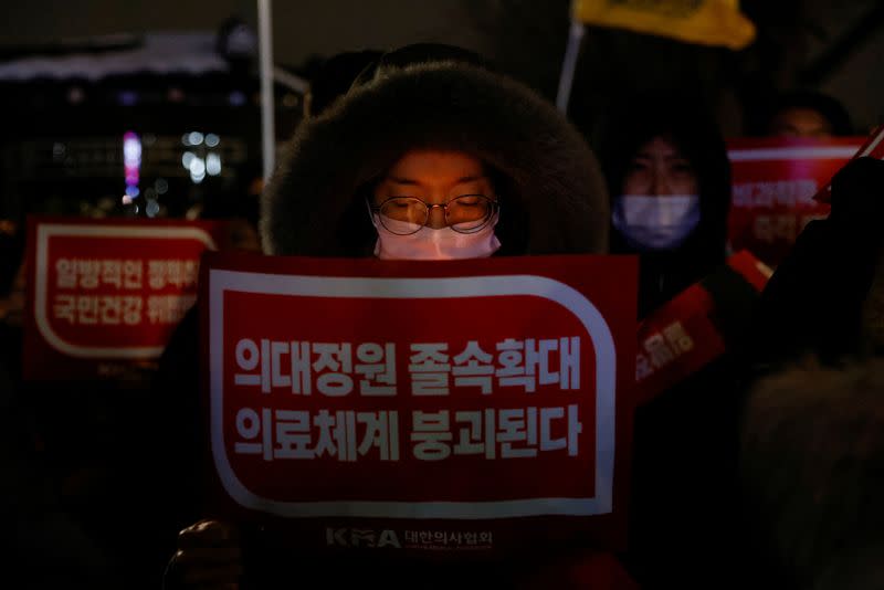 Doctors take part in a protest against a plan to admit more students to medical school, in front of the Presidential Office in Seoul