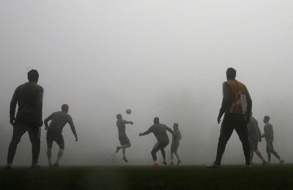 Monaco players train in the fog in La Turbie, France