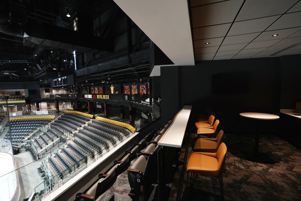 One of the many luxury suites at the new Arizona State University Mullett Arena, is shown Monday, Oct. 24, 2022, in Tempe, Ariz. The university will be sharing the arena with the Arizona Coyotes NHL hockey team. (AP Photo/Ross D. Franklin)