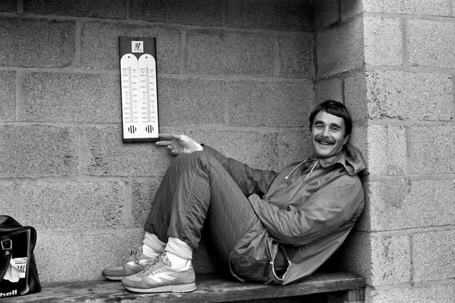 Britain’s Nigel Mansell, who went on to win four British Grands Prix, shelters from the rain at Silverstone in 1985 as he waits for practice. Mansell won the event in 1986, 1987, 1991 and 1992