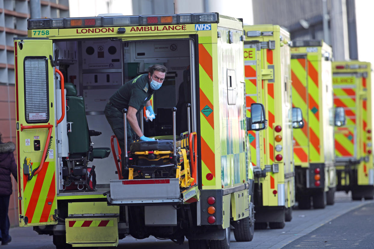 A paramedic wearing a face mask cleans the back of an ambulance at the Royal London Hospital in London, during England's third national lockdown to curb the spread of coronavirus. Picture date: Thursday January 21, 2021. (Photo by Yui Mok/PA Images via Getty Images)