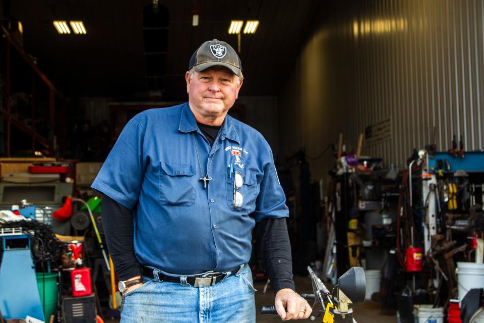 Johnson County Supervisor candidate Phil Hemingway, of Iowa City, stands for a photo on Tuesday, Dec. 11, 2018, at his shop on Liberty Drive in Iowa City. Hemingway is now running again for a seat on the board in 2022.