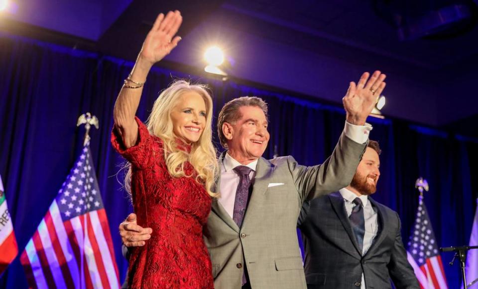 Steve Garvey and his wife Candace Garvey wave to supporters on election night in Palm Desert on Super Tuesday, March 5, 2024.