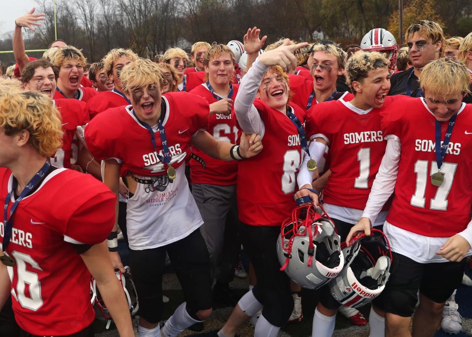 Somers players celebrate their 45-13 victory over Rye in the Section 1 Class A championship game at Mahopac High School Nov. 11, 2022. 