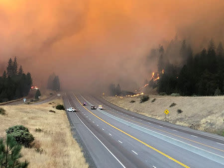 Smoke rises as the large delta fire spreads along Shasta County in California, U.S., September 5, 2018 in this picture obtained on September 6, 2018 from social media. CALIFORNIA HIGHWAY PATROL/via REUTERS