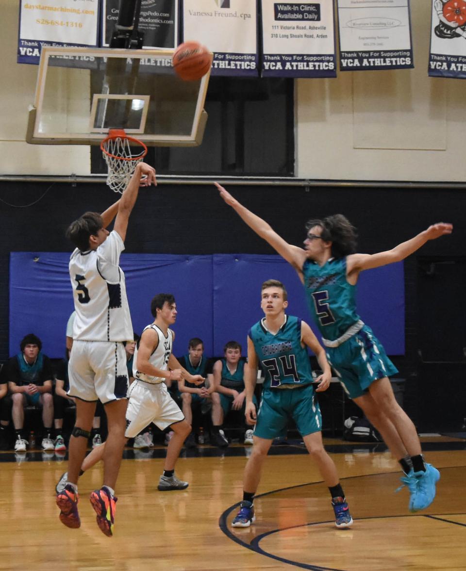 Veritas Christian's Aldric McMahan (5) takes a 3-point shot during a recent game at Veritas.