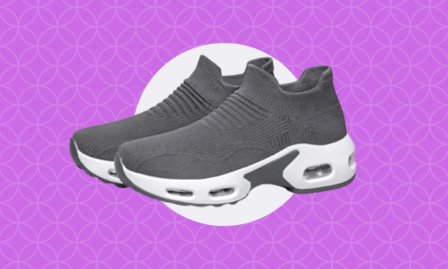 Gray slip on sock-like sneakers with white soles shown on purple background.