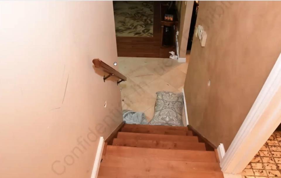 The staircase inside the Tecumseh home of Derek Teskey's mother, where Teskey became violent with OPP officers before he was fatally shot on June 14, 2019.