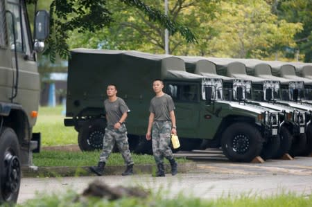 FILE PHOTO: Troops are seen at the Shek Kong military base of the People's Liberation Army (PLA) in New Territories