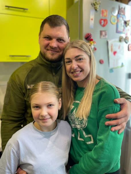 PHOTO: Oleksiy Storozhez, a Ukrainian soldier serving with an air reconnaissance unit in his native region of Kharkiv, pictured during a visit home with his wife, Katya, and daughter, Sofia. (Tom Soufi Burridge/ABC News)