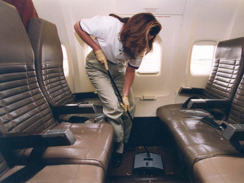 Southwest flight attendant cleans the aircraft