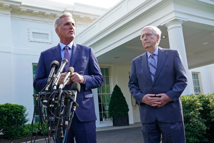 House Majority Leader Kevin McCarthy of Calif., left, standing next to Senate Minority Leader Mitch McConnell of Ky., right, speaks to reporters outside of the West Wing of the White House in Washington, Tuesday, May 9, 2023, following a meeting with President Joe Biden on the debt limit.