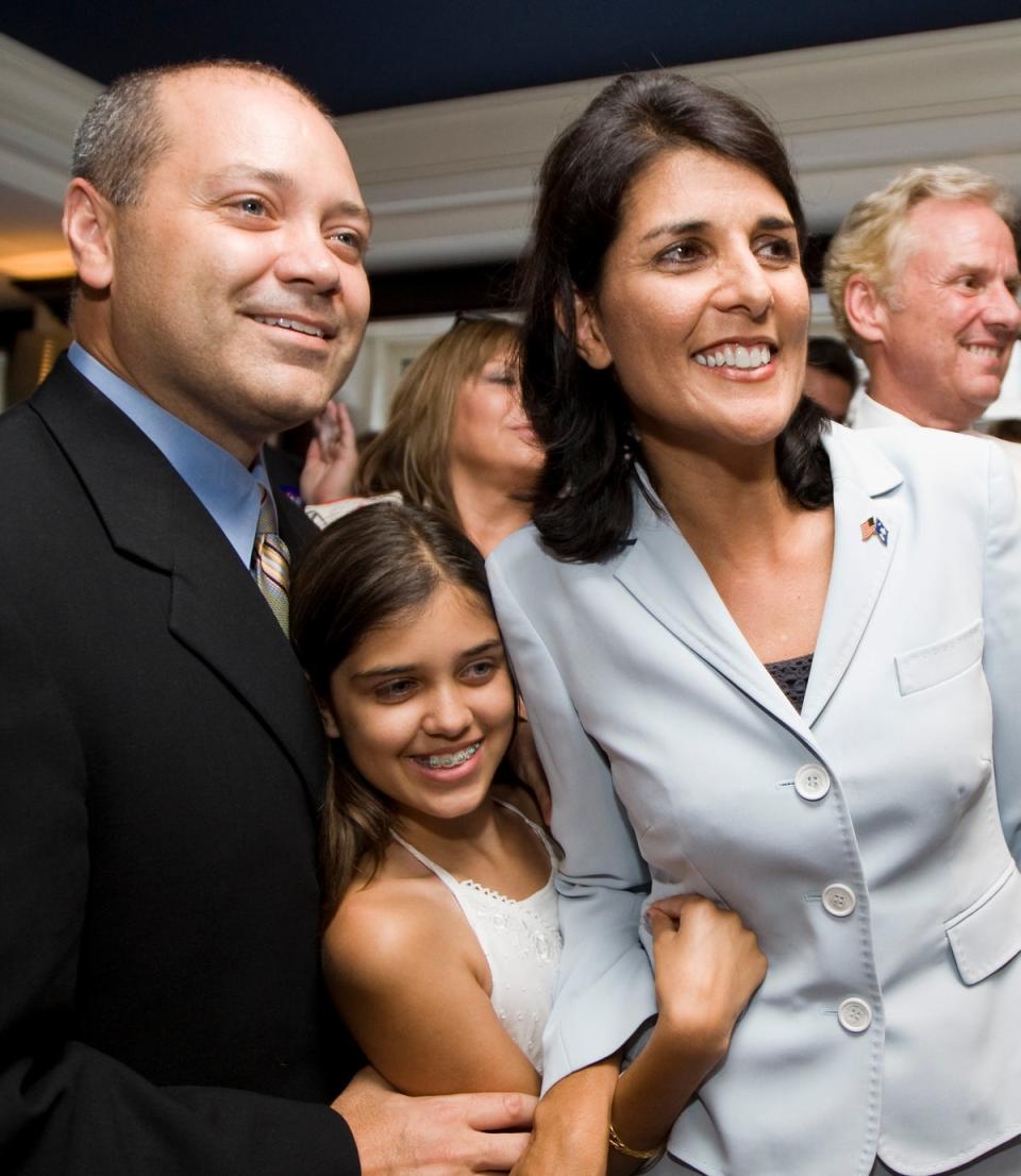 Michael, Rena and Nikki Haley. The couple also have a son (Getty Images)