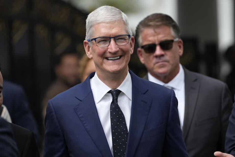 Apple CEO Tim Cook walks after a meeting with Indonesian President Joko Widodo at the palace in Jakarta, Indonesia, Wednesday, April 17, 2024.(AP Photo/Achmad Ibrahim)