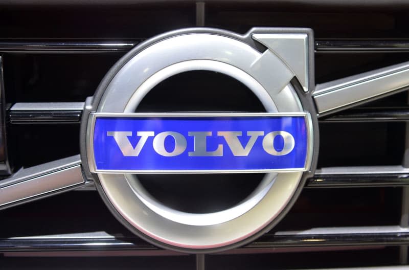 The Volvo logo can be seen on a displayed car during the International Auto Show. picture alliance / Uli Deck/dpa