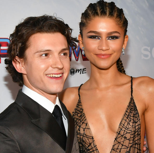 Tom Holland Puts His Arm Around Zendaya During Their Friend's