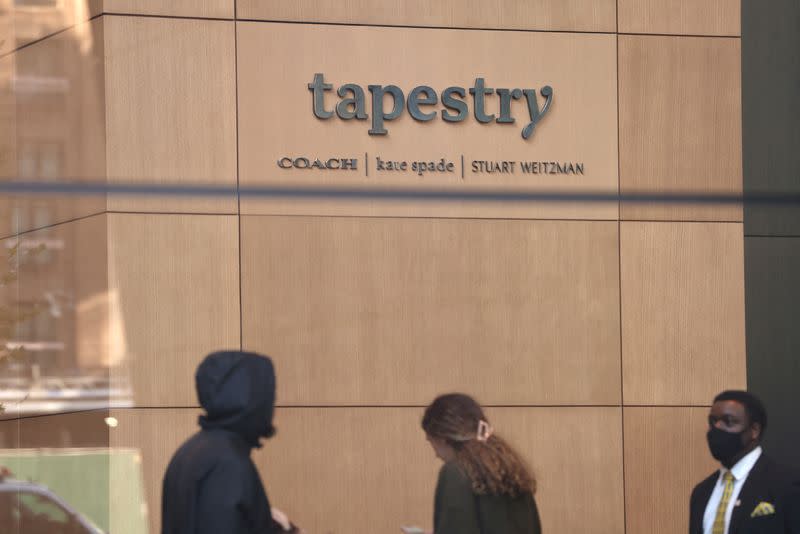 FILE PHOTO: Signage is seen in the offices of Tapestry, Inc., in Manhattan, New York