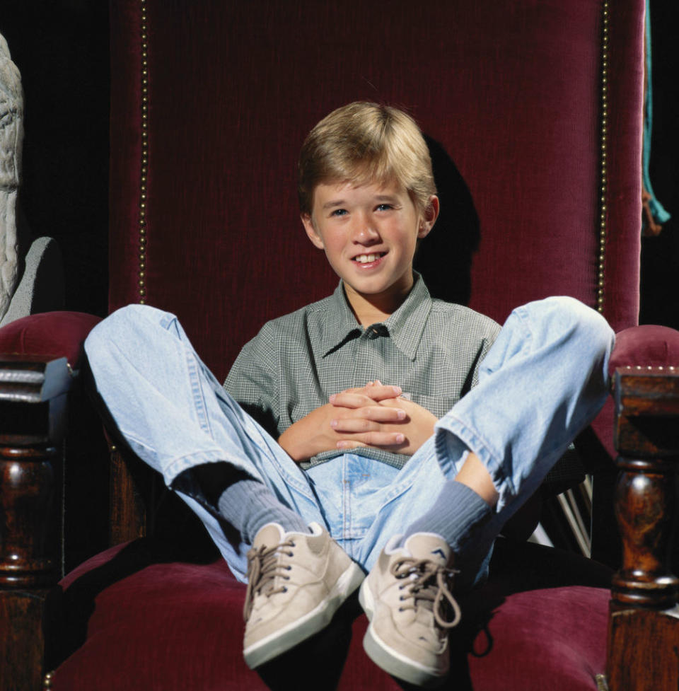 Haley sitting with his feet up on the chair