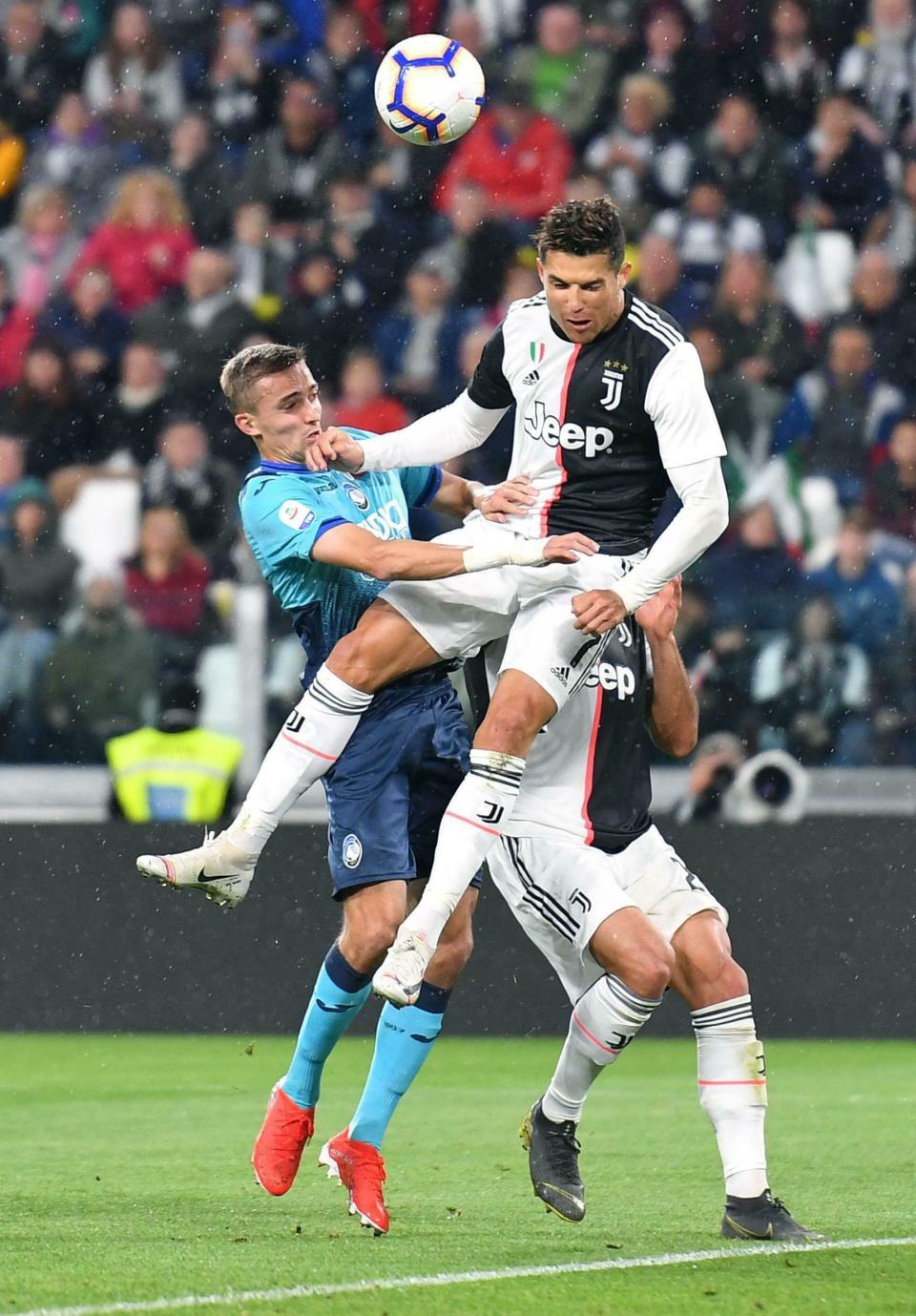 Juventus FC's Cristiano Ronaldo, top right, goes for the ball during a Serie A soccer match against Atalanta BC at the Allianz Stadium in Turin, Italy, Sunday, May 19, 2019. (Alessandro Di Marco/ANSA via AP)