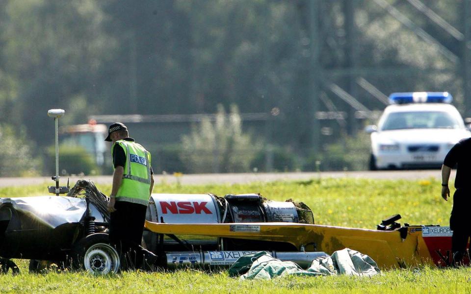 Police inspect the car that Hammond crashed in 2006 which left him in a coma for a fortnight