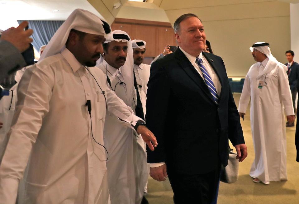 Secretary of State Mike Pompeo arrives for the signing ceremony for a U.S.-Taliban agreement in the Qatari capital, Doha.