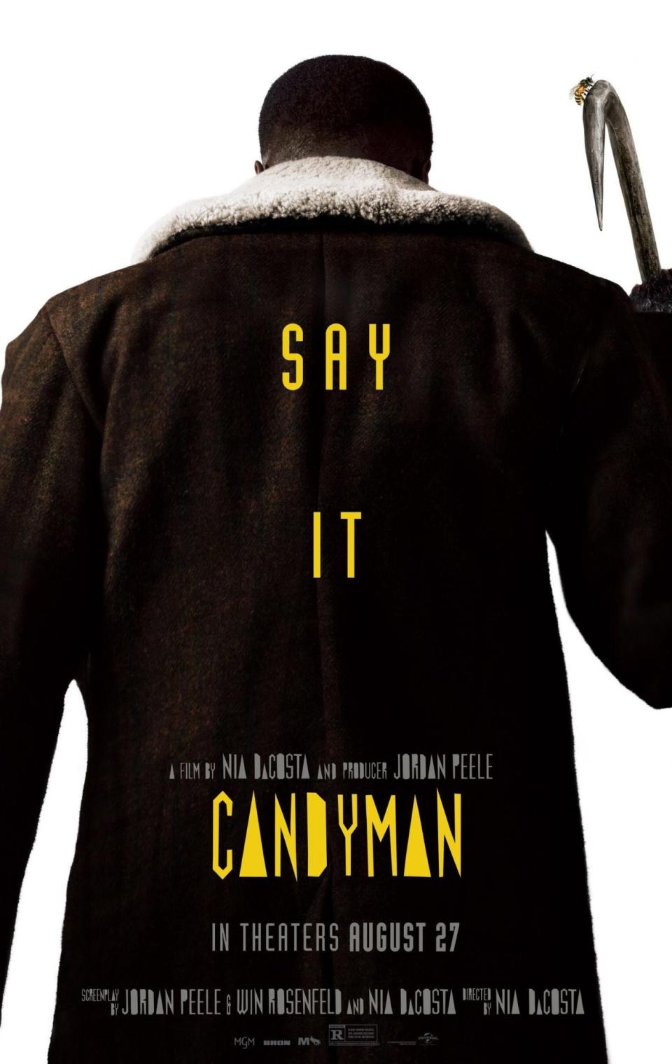 The Poster for Candyman, which shows the silhouette of a man's back with the words "SAY IT."