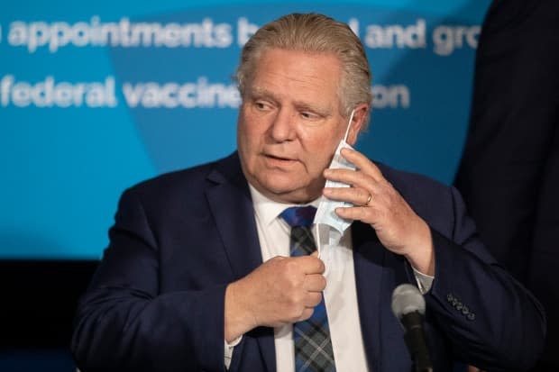 Ontario Premier Doug Ford, who earlier this month accused paid sick leave advocates of 'playing politics,' announced on Thursday that his government has started work on a similar program. (Chris Young / Canadian Press - image credit)