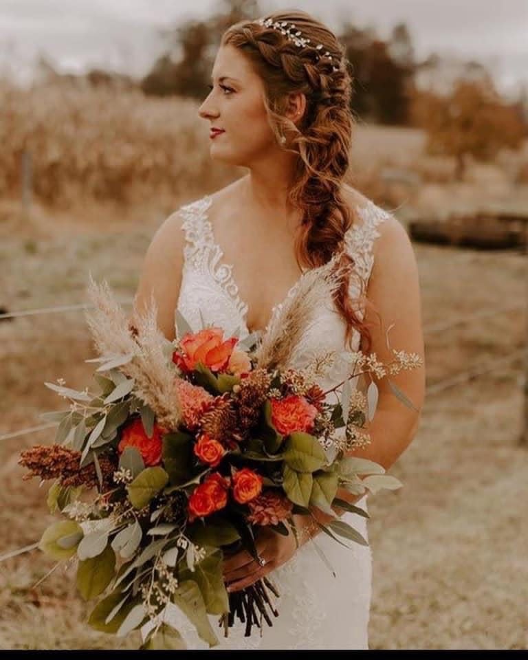 Lindsey Forbes, makeup artist and owner of Fades Beards and Beauty, highlighted recent trends she is seeing in bridal hair and makeup, as seen here on recent bride, Morgan Sowers.  Sowers chose pearl accessories, hair in a half up style, and light, classy, natural makeup.