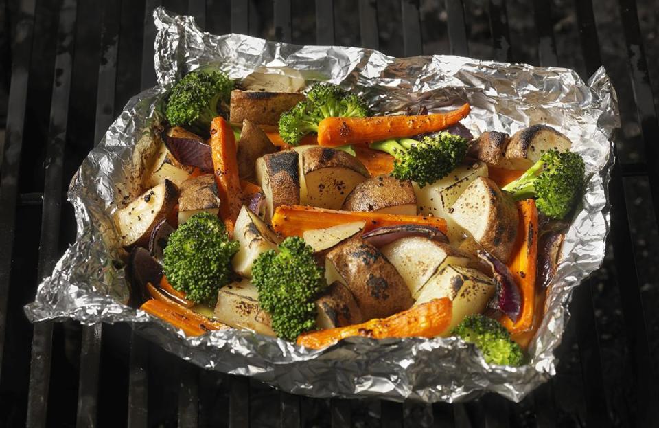 <p>If you’re looking to grill up some <a href="https://www.thedailymeal.com/healthy-eating/monthly-guide-seasonal-produce?referrer=yahoo&category=beauty_food&include_utm=1&utm_medium=referral&utm_source=yahoo&utm_campaign=feed" rel="nofollow noopener" target="_blank" data-ylk="slk:seasonal vegetables;elm:context_link;itc:0;sec:content-canvas" class="link ">seasonal vegetables</a> alongside your meat options, you want to be careful, since they can burn easily. Wrapping your veggies in aluminum foil will allow them to be heated on the grill without the risk of being burnt to a crisp.</p>