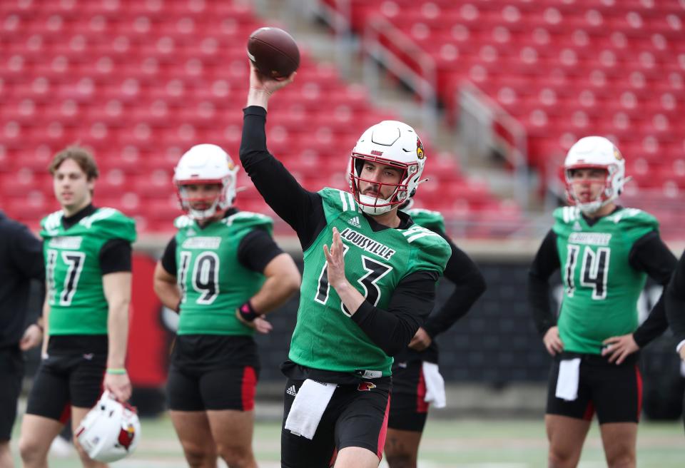 Louisville quarterback Jack Plummer at a March 2023 practice. Plummer has experience in coach Jeff Brohm's system, but his teammates have some catching up to do.