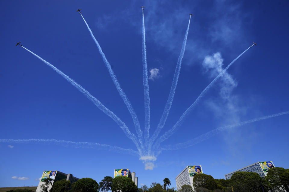 Aircrafts from the Esquadrilha da Fumaca, or Smoke Squadron, fly over a military parade on Independence Day in Brasilia, Brazil, Thursday, Sept. 7, 2023. (AP Photo/Eraldo Peres)