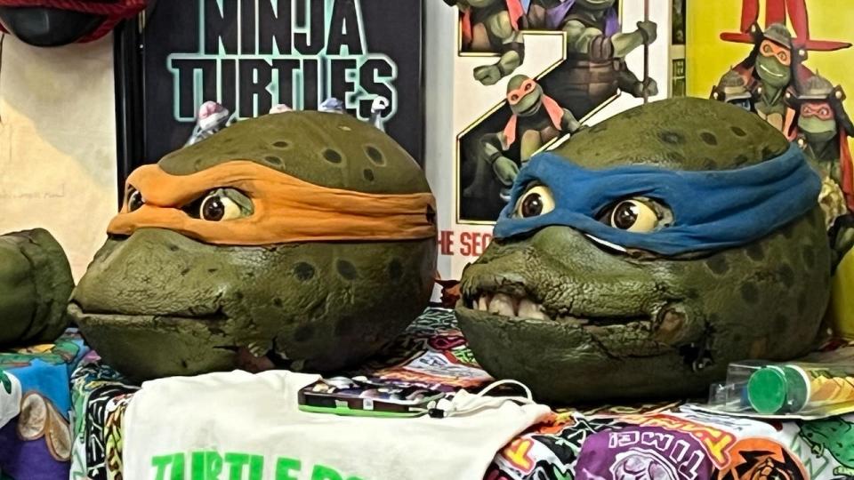 <div>Screen used masks from the Teenage Mutant Ninja Turtles live action movies. (Photo by Dave Herndon)</div>