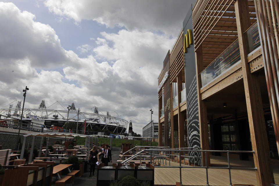 The Olympic Stadium is seen from the newly constructed McDonald's restaurant at the Olympic Park in east London, Monday, June 25, 2012. The restaurant is designed to be reusable and recyclable after the London 2012 Olympic and Paralympic Games. (AP Photo/Lefteris Pitarakis)