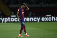 Barcelona's Lamine Yamal reacts during a Spanish La Liga soccer match between Barcelona and Valencia at the Olimpic Lluis Companys stadium in Barcelona, Spain, Monday, April 29, 2024. (AP Photo/Joan Monfort)