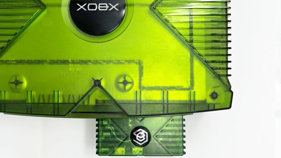 Transparent green EON XBHD adapter attached to original xbox