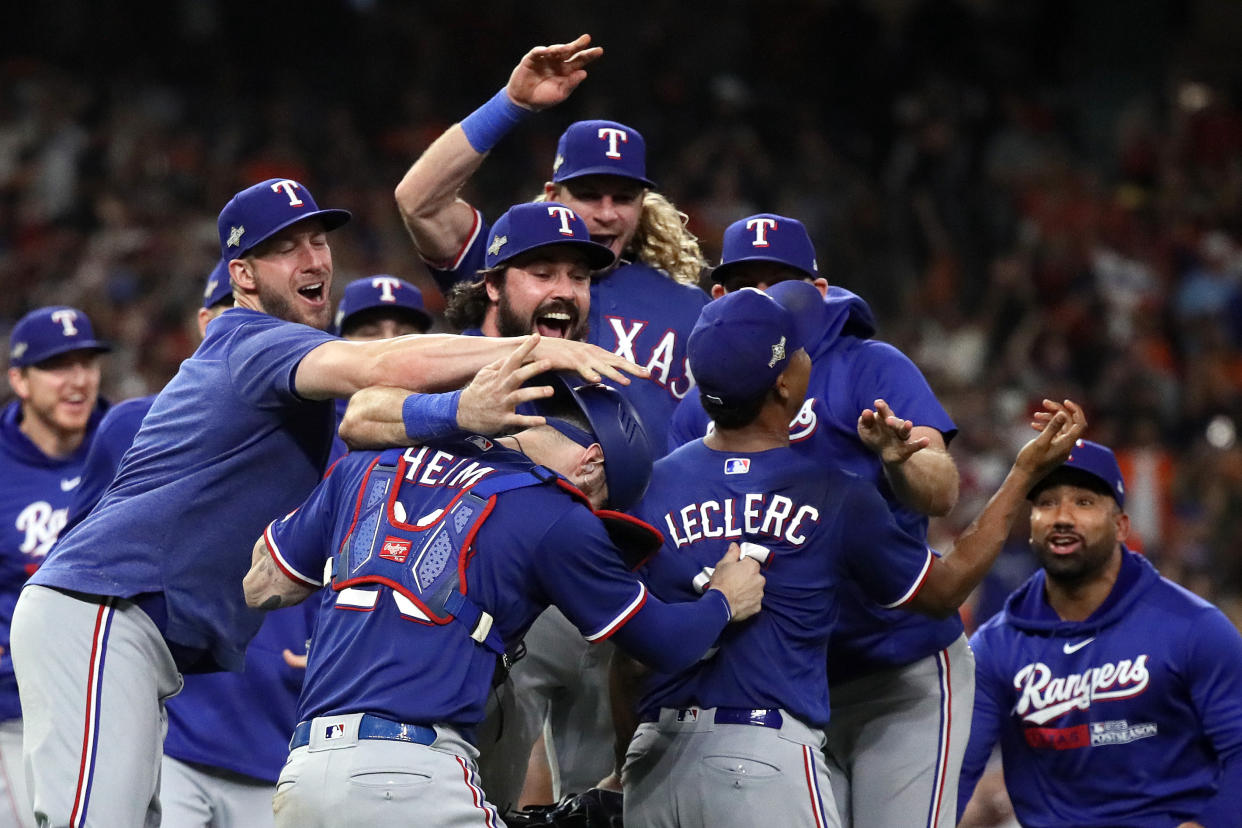 Texas celebrates the win. (Bob Levey/Getty Images)