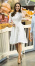 <p>In this photo, the Duchess is wearing a cream lace dress by Australian fashion label Zimmermann. A dreamy summer look. <i>[Photo: PA]</i><br></p>