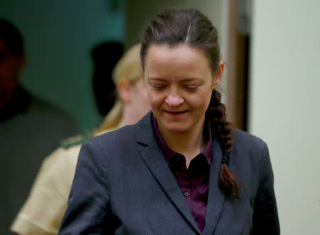FILE PHOTO: Defendant Beate Zschaepe arrives for the continuation of her trial at a courtroom in Munich, southern Germany, December 8, 2015. REUTERS/Michael Dalder/File Photo