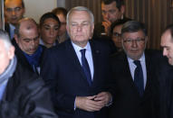 French Foreign Minister Jean-Marc Ayrault arrives at Charles de Gaulle Airport’s Mercure hotel, where passengers’ relatives have been met by EgyptAir representatives and a team of medical and psychological support staff, outside of Paris, Thursday, May 19, 2016. (AP Photo/Michel Euler)