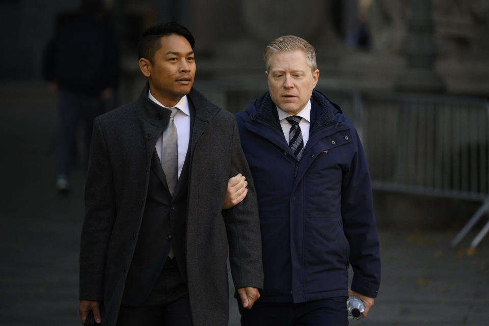 Actor Anthony Rapp, right, and his partner Ken Ithiphol, arrive at federal court in New York on Oct. 19, 2022.  (Angela Weiss / AFP - Getty Images)