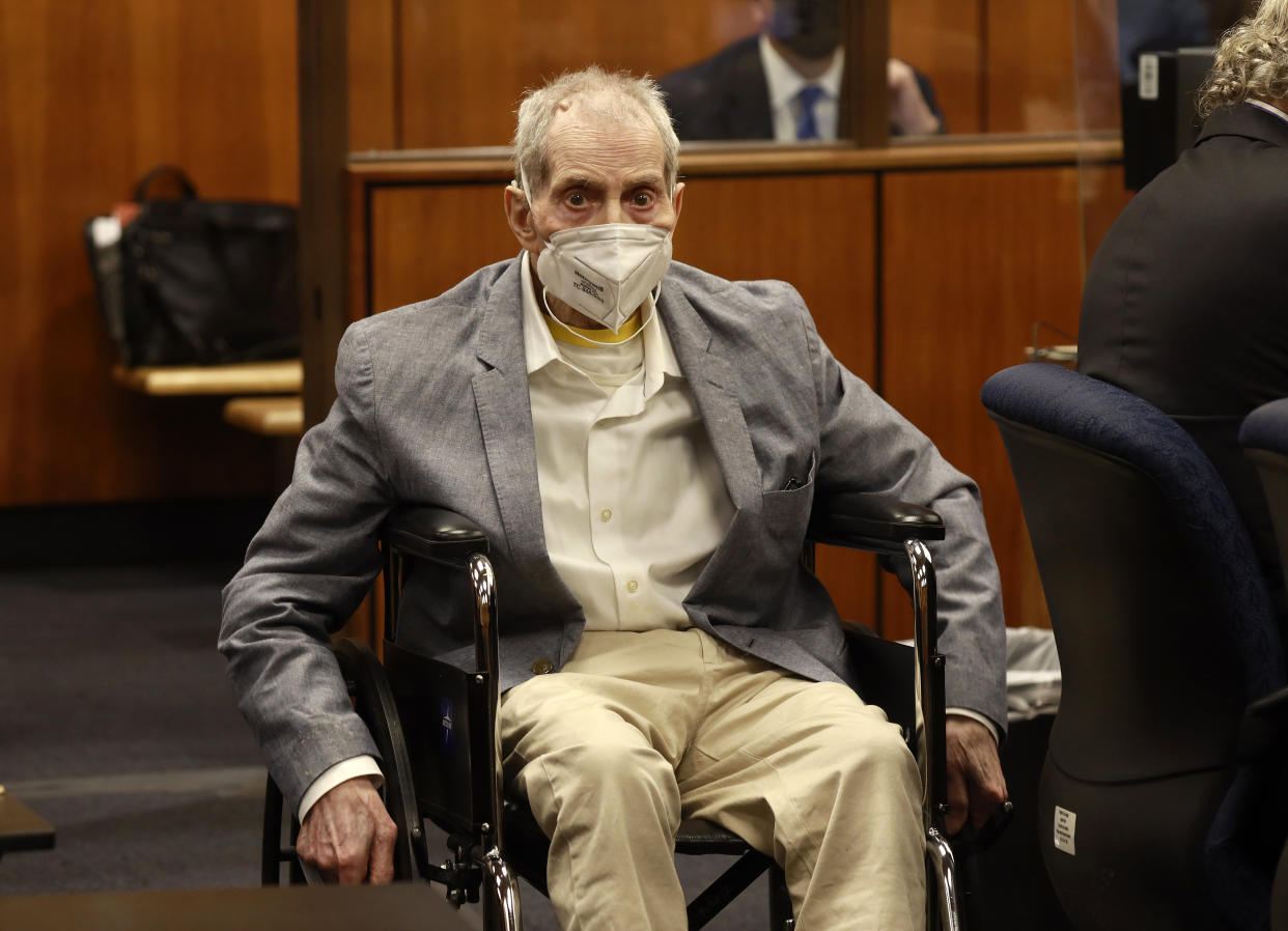 Robert Durst in his wheelchair spins in place as he looks at people in the courtroom as he appears in a courtroom in Inglewood, Calif. on Wednesday, Sept. 8, 2021, with his attorneys for closing arguments presented by the prosecution in the murder trial of the New York real estate scion who is charged with the longtime friend Susan Berman's killing in Benedict Canyon just before Christmas Eve 2000. (Al Seib/Los Angeles Times via AP, Pool)