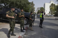 Palestinian security forces newly deployed in the city of Jenin are seen stationed at a main junctions in the occupied West Bank city of Jenin, Sunday, Aug. 13, 2023. (AP Photo/Nasser Nasser)