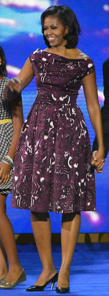 <b>First Lady Michelle Obama at the Democratic National Convention in Charlotte, North Carolina</b><br><br>Michelle stole the show in this purple, geometric print Laura Smalls dress. The patent, pointed heels add a touch of height to her frame and her glossy lips and perfect blow dry complete the look.