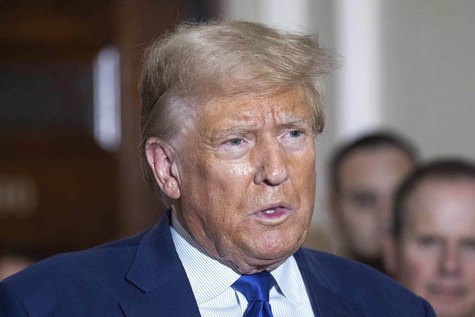 Former President Donald Trump speaks to the media as he exits the courtroom of his civil business fraud trial at New York Supreme Court, Wednesday, Oct. 25, 2023, in New York. (AP Photo/Yuki Iwamura)