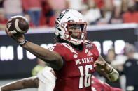 FILE- North Carolina State quarterback MJ Morris (16) passes during the second half of an NCAA college football game against Boston College Saturday, Nov. 12, 2022, in Raleigh, N.C. NC State takes on Maryland in Duke's Mayo Bowl. (AP Photo/Chris Seward, File)